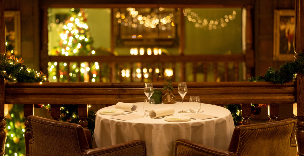 A photograph of a table and chair set up for dinner at Boringdon Hall